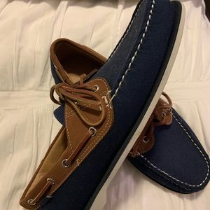 J. Crew boat shoes. Navy and tan leather. Never worn. Size 10.5